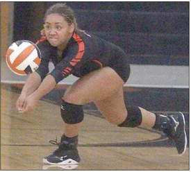 Kieryn Adams picks up a Lady Bulldog attack in game one for one of her 20 digs. Sticker Photo By Darrell Vyvjala