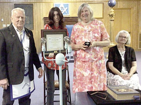Masons present Community Builder Award to Rev. Higgs