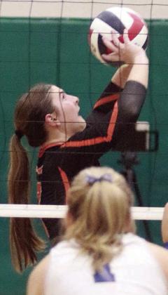 Landry Zapalac in set two of the state semifinal. Sticker Photo By Darrell Vyvjala