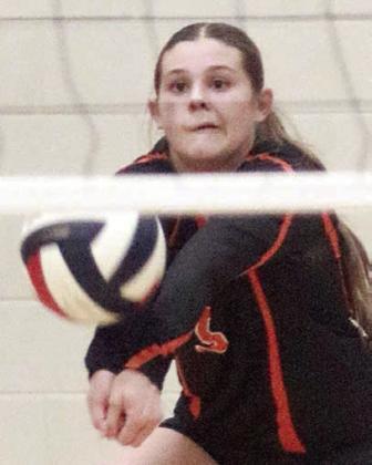 Haylee Vacek in the first game. Sticker Photo By Darrell Vyvjala