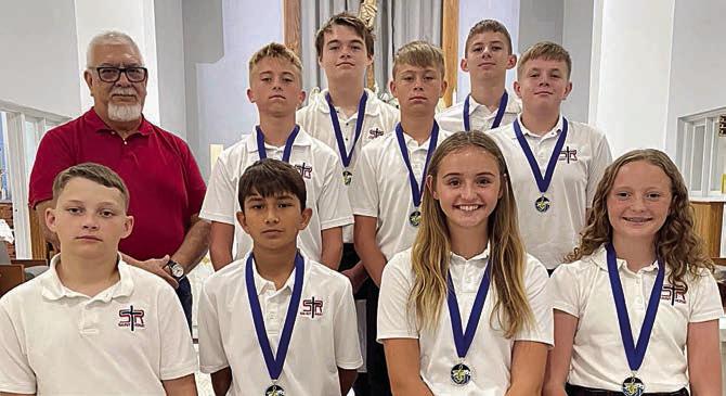Soloists – (front row, from lef) Cannon Lykke, Rilee Durfey, Miranda Bonner, Caroline Bartek, (back row) band director Julius Castillo, Weston Hollas, Brock Seger, Brett Hollas, William Eudy and Bo Brossmann.