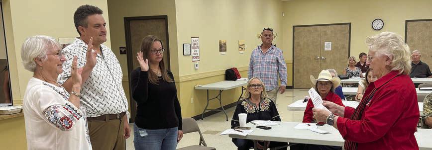 Officers sworn in – State Republican Executive Committee SD18 member Cheryl Thompson-Draper (right) swore in new officers (from left) Deborah Frank, secretary; Craig Moreau, vice chair; and Michelle Malak, treasurer.