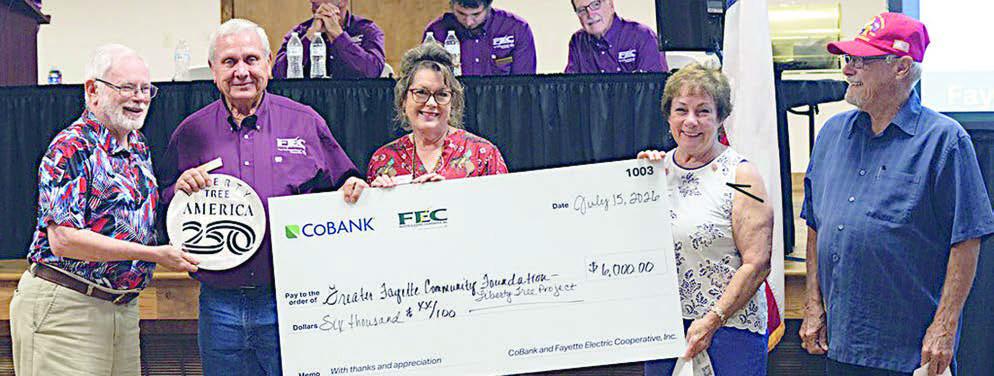 Greater Fayette Community Foundatio n for the Fayette County Semiquincentennial Commission’s Liberty Tree Project received $6,000 to support countywide tree-planting efforts. Shown are (foreground, from left) Larry Jackson, Fayette County Semiquincentennial Commission; FEC board president Joseph Kruppa; and Diana Wilson, Karen Mahoney-Woods and Glenn Altwein.