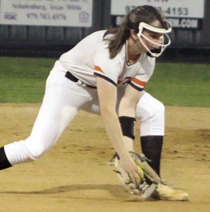 Shortstop Haylie Goode scoops a grounder for an out in the top of the fifth inning against Moulton.