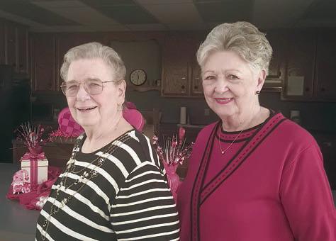 Hostesses for the meeting were (from left) Janet Kobza and Patricia Greeson.