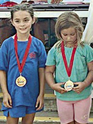 KIDS’ COOKOFF WINNERS (6 &amp;amp; UNDER) – Everly Clack (Summer Time Cookers, Waller) and Waylynn Bowie (SOS Cookers, Katy). Sticker Photo By Kade Vyvjala