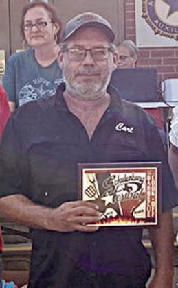 1ST PLACE RIBS – “Cast Iron Cookers,” represented by Carl Davis. Sticker Photo By Kade Vyvjala