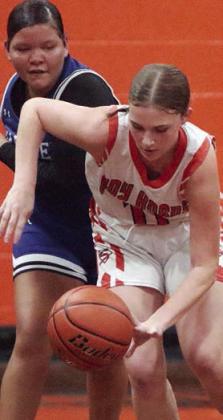 Alana Herzik gets a steal in the first half. Sticker Photo By Darrell Vyvjala