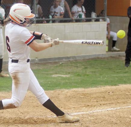 Haylie Goode sends a triple to the left-field wall in game one on April 16. Sticker Photo By Darrell Vyvjala
