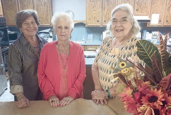 Hostesses were (from left) Nova Stonecipher, Mary Demel and Jan Ripper.