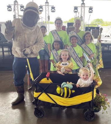 Second Place – “Bee Happy” Vivian and William Dennis with Tom Brents. Sticker Photo By Darrell Vyvjala
