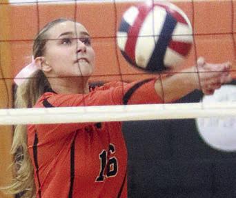 Jenna Guentert gets to a Ladycat tip in the first set. Sticker Photo By Darrell Vyvjala