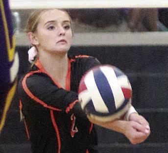 Miranda Bonner picks up a dig in game four against Weimar. Sticker Photo By Darrell Vyvjala
