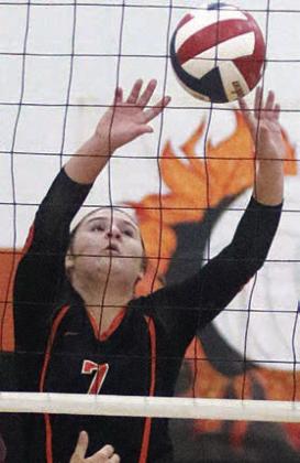 Landry Zapalac passes the ball over for a point in game three against Ganado. Sticker Photo By Darrell Vyvjala