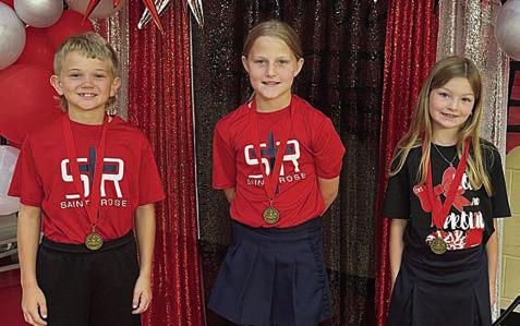Grades 2-4 High Honors - (from left) Ben Sustr, 3rd grade; Emileigh Divin, 4th grade; and Harper Wright, 2nd grade.