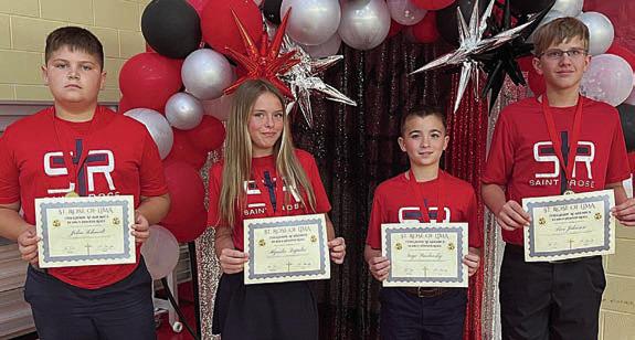 Grade 7 Yearly Honor Roll – (from left) John Schmidt, Kynslee Zapalac, Gage Smrkovsky and Levi Johnson.
