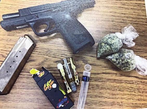 Marijuana, drug paraphernalia, and a pistol were seized after a traffic stop on Interstate 10 Saturday.