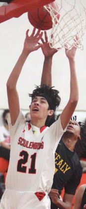 Alex Lozano scores under the basket and gets fouled from behind, resulting in a three-point play in the second half against Sealy. Sticker Photo By Darrell Vyvjala