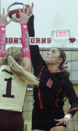Four-set win in district finale