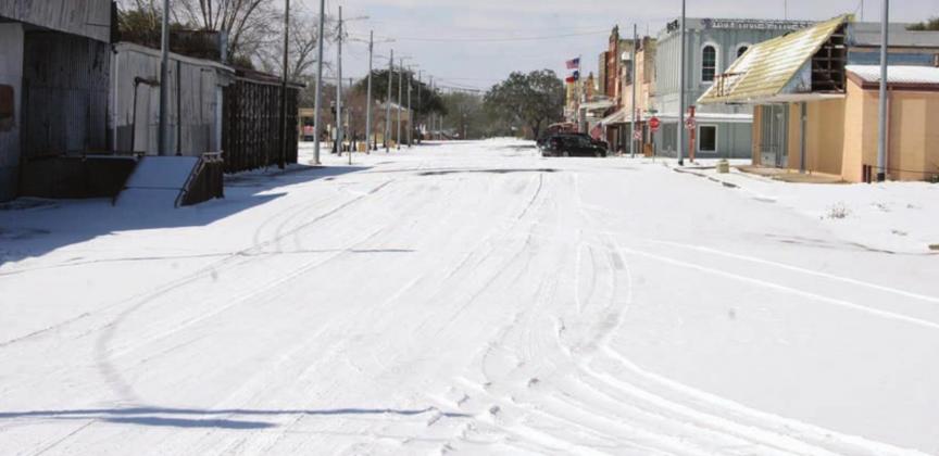 North Main Street is shown during the winter storm that blanketed the area in snowfall and shut down most businesses. Covered in the Feb. 18 and Feb. 25 issues, it also caused power outages and accidents. Sticker File Photo