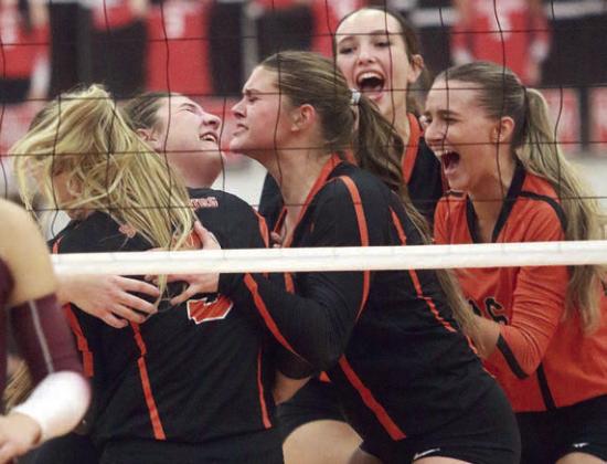 Celebrating their win after the final point are (from left) Reagan Dusek, Landry Zapalac, Haylee Vacek, Grace Schramek, and Jenna Guentert. Sticker Photo By Darrell Vyvjala