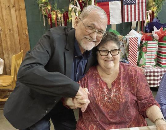 A 75-year membership pin was presented to Katherine Dittrich (right) by Hermann Sons Life Grand Lodge board member David Noak (left).