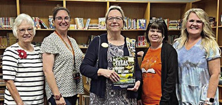 SCHULENBURG ELEMENTARY presentation – (from left) Carolyn Caflisch, regent, Smith-McMillan Chapter, NSDAR; Stacy Fogle, fourth grade language arts teacher; Kim Joost, librarian, Smith-McMillan Chapter, NSDAR; Monica Berger, SES library; and Dr. Angie Westerfield, principal, Schulenburg Elementary.