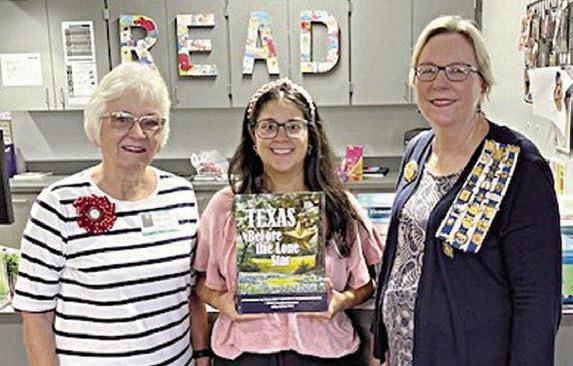FLATONIA ELEMENTARY presentation – (from left) Carolyn Caflisch, regent, Smith-McMillan Chapter, NSDAR; Amanda Bass, Flatonia Elementary library; and Kim Joost, librarian, Smith-McMillan Chapter, NSDAR