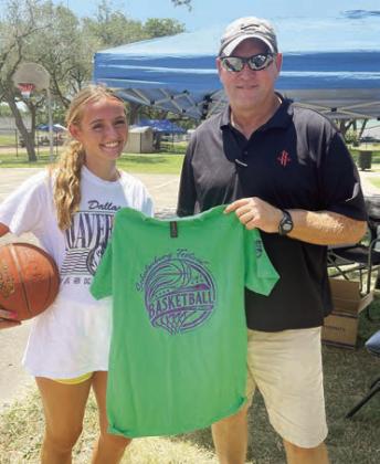 Three-point shooting contest winners – Miranda Bonner (left) and Shane Hollas. Sticker Photo By Darrell Vyvjala