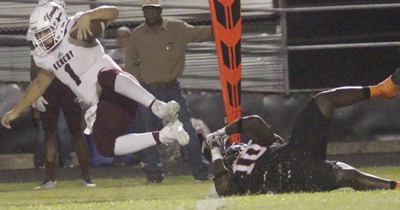 Tavondrick Ellison trips up Kenedy quarterback David Salas for a loss of 2 in the first quarter. Sticker Photo By Layne Vyvjala