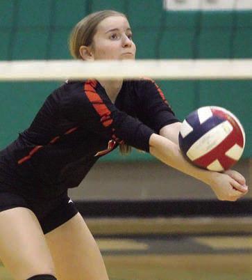 Madison Kunschick passes the ball in the bi-district win. Sticker Photo By Darrell Vyvjala