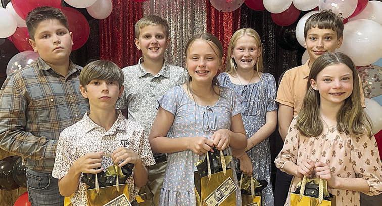 5th Grade – (front row, from left) Barett Redman, Kynslee Zapalac, Rylee Wright, (back row) John Schmidt, Levi Johnson, Briley Hartensteiner and Justin Schramek.