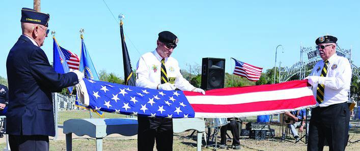 Participat ing in the Folding of the Flag ceremony were (from left) Flatonia American Legion Post 94 commander Danny Vyvjala, Donnie Christen and Vietnam Veterans of America Chapter 870 president Andy Janda. Photos By Melanie Berger/Courtesy of Flatonia Argus