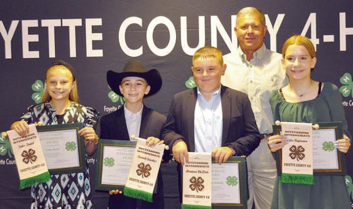 Outstanding Intermediates – (front row, from left) Cailee Daniel, Crockett Guenther,  Abraham McBride and Kylee Hoffmann; (back) presenter Commissioner Harvey Berckenhoff.