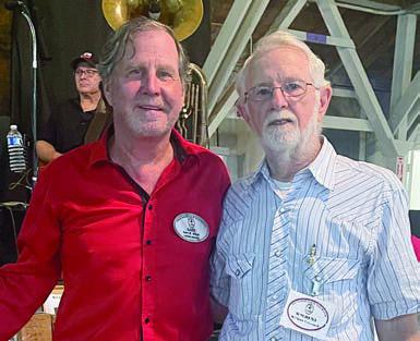 PHOTO ABOVE – $1,000 lifetime membership to the Polka Lovers Club of Texas Museum was won by Wilbert Cernosek (right). He is shown with PLCTM president Gary Bucek (left). PHOTO AT RIGHT – GOODWILL AMBASSADORS for the Polka Lovers Klub of America Louis Stewart and Paula Amsler enjoy a dance.