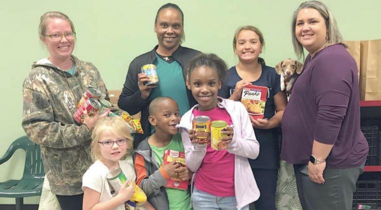 Girl Scouts collect donations for Food Pantry