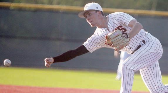 Nick Goode sidearms a strikeout pitch in the seventh inning of game two. Sticker Photo By Darrell Vyvjala