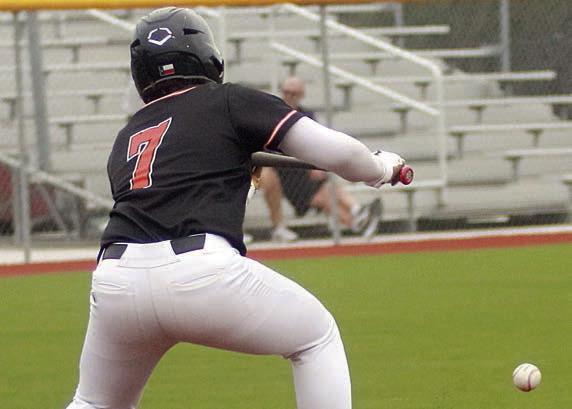 Landon Conner drops down a sacrifice bunt in the top of fourth in game one. Sticker Photo By Darrell Vyvjala