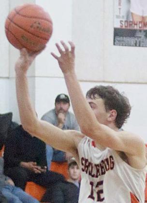 Van Prihoda releases a three-pointer in the fourth quarter vs. Shiner. Stcker Photo By Darrell Vyvjala