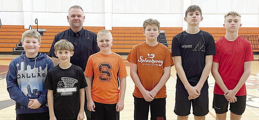 BOYS’ DIVISION WINNERS – (front, from left) Brody Brossmann, 9-year-old; Tripp Brown, 10-yearold; Seth Seydler, 11-year-old; William Herzik, 12-year-old; William Eudy, 13-year-old; and Weston Hollas, 14-year-old. Also pictured is Council 2902 Grand Knight Paul Zapalac (back).
