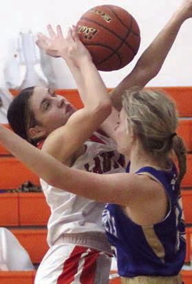 Fay Kutac gets fouled by a Lady Hornet to earn free throws in the fourth quarter.