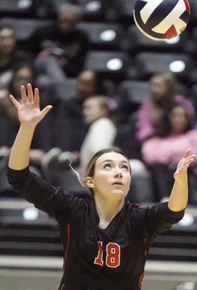 Keaton Walker serves in game two. Sticker Photo By Darrell Vyvjala