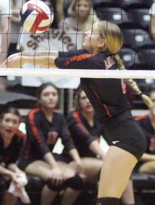 Madison Kunschick track down a deflected ball in game one. Sticker Photo By Darrell Vyvjala