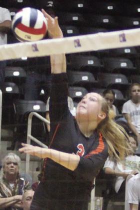 Reagan Dusek sends over a kill in game three. Sticker Photo By Darrell Vyvjala