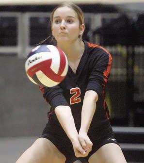 Madison Kunschick passes the ball in game one. Sticker Photo By Darrell Vyvjala