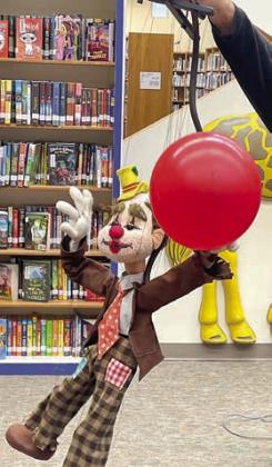 Puppets perform