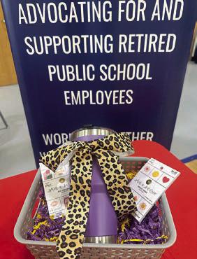 A door prize basket that featured a purple tumbler was given away by the Fayette County Retired Teachers Association.