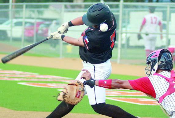 Landon Connor knocks off the catcher’s mitt on his swing in the bottom of the sixth of game two. He reached on catcher’s interference as part of the Horns’ five-run rally to end the series. Sticker Photo By Darrell Vyvjala
