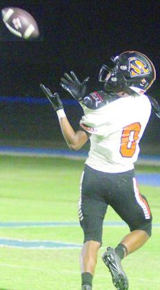 Byron Johnson runs under a pass from Da’Terrion Houston for a 27-yard touchdown in the fourth quarter. Sticker Photo By Darrell Vyvjala