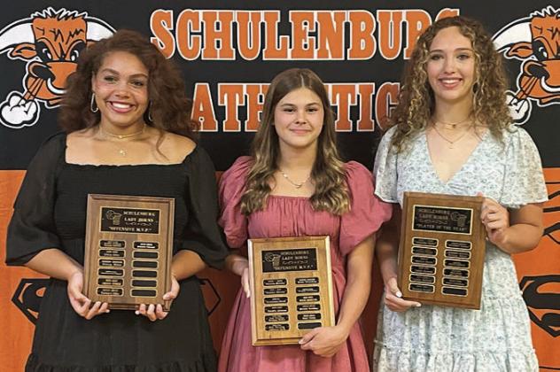 GIRLS’ BASKETBALL – (from left) Arianna Vincent, Offensive MVP; Haylee Vacek, Defensive MVP; and Grace Schramek, Player of the Year. Sticker Photo By Darrell Vyvjala